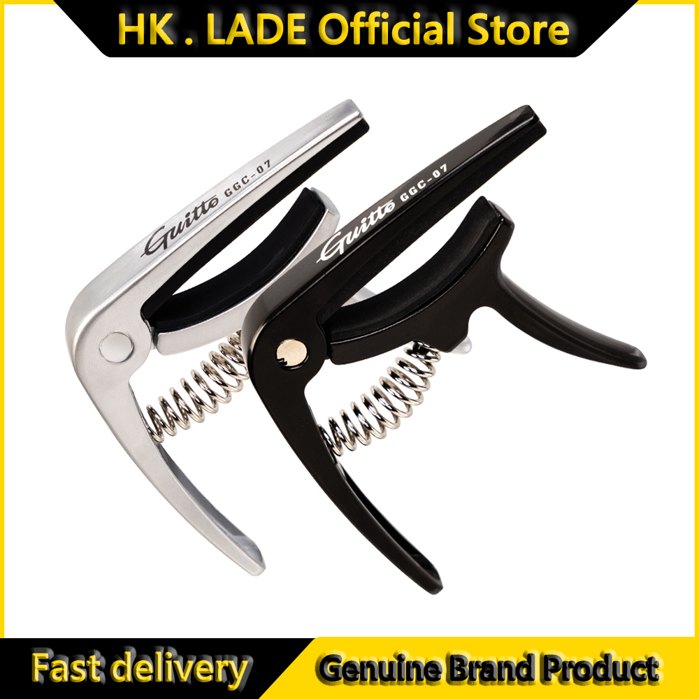 GUITTO GGC-07 Ukulele Capo Qui - Musical Instrument In English recension och pris